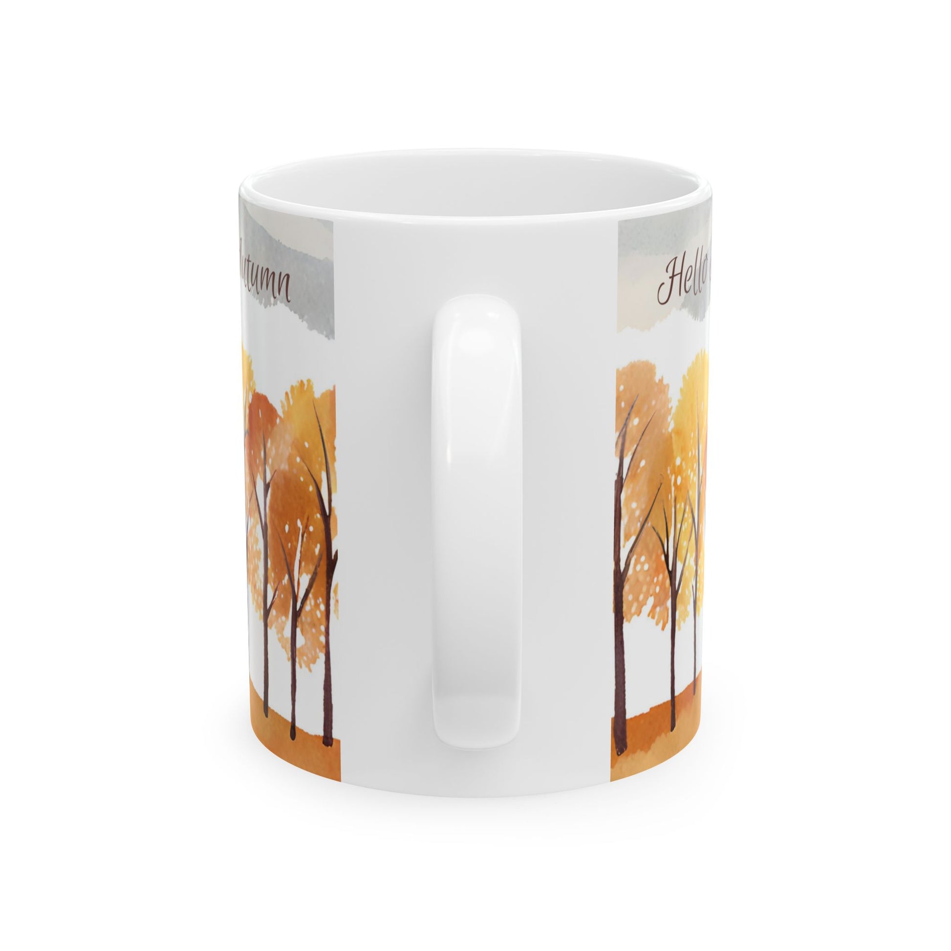 White mug with autumn tree design on a white background