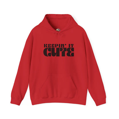 Red hoodie with 'KEEPIN' IT CUTE' text on a white background
