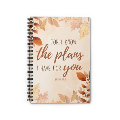Notebook with leaf design and text on a white background