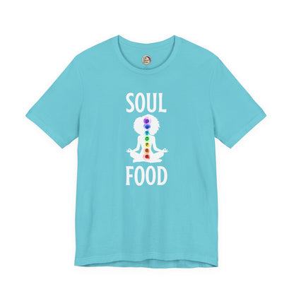 Light blue t-shirt with a graphic of a person in a meditative pose and 'Soul Food' text on a white background