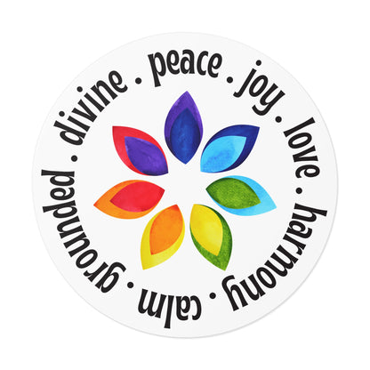 Round sticker with rainbow-colored leaves and motivational words on a white background