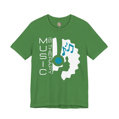 Green t-shirt with music-themed design on a white background
