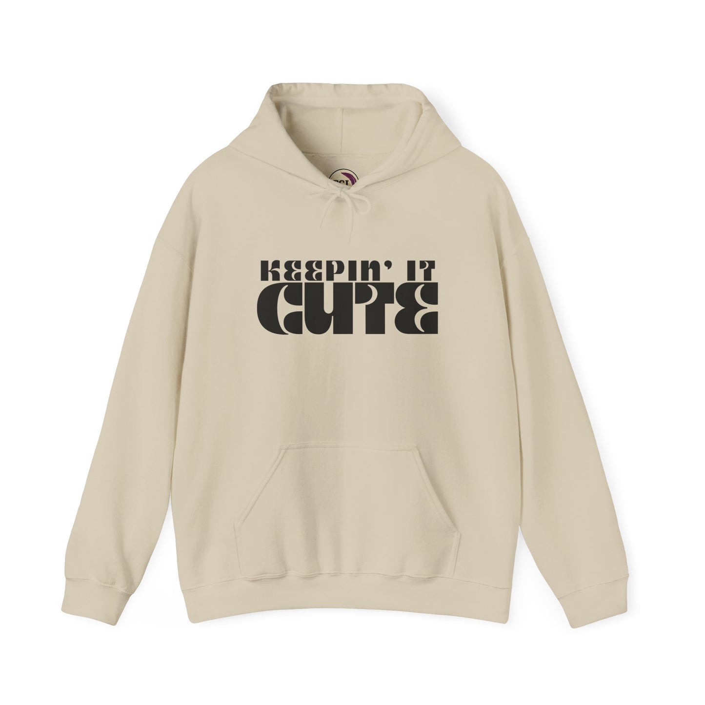 Beige hoodie with 'KEEPIN' IT CUTE' text on a white background