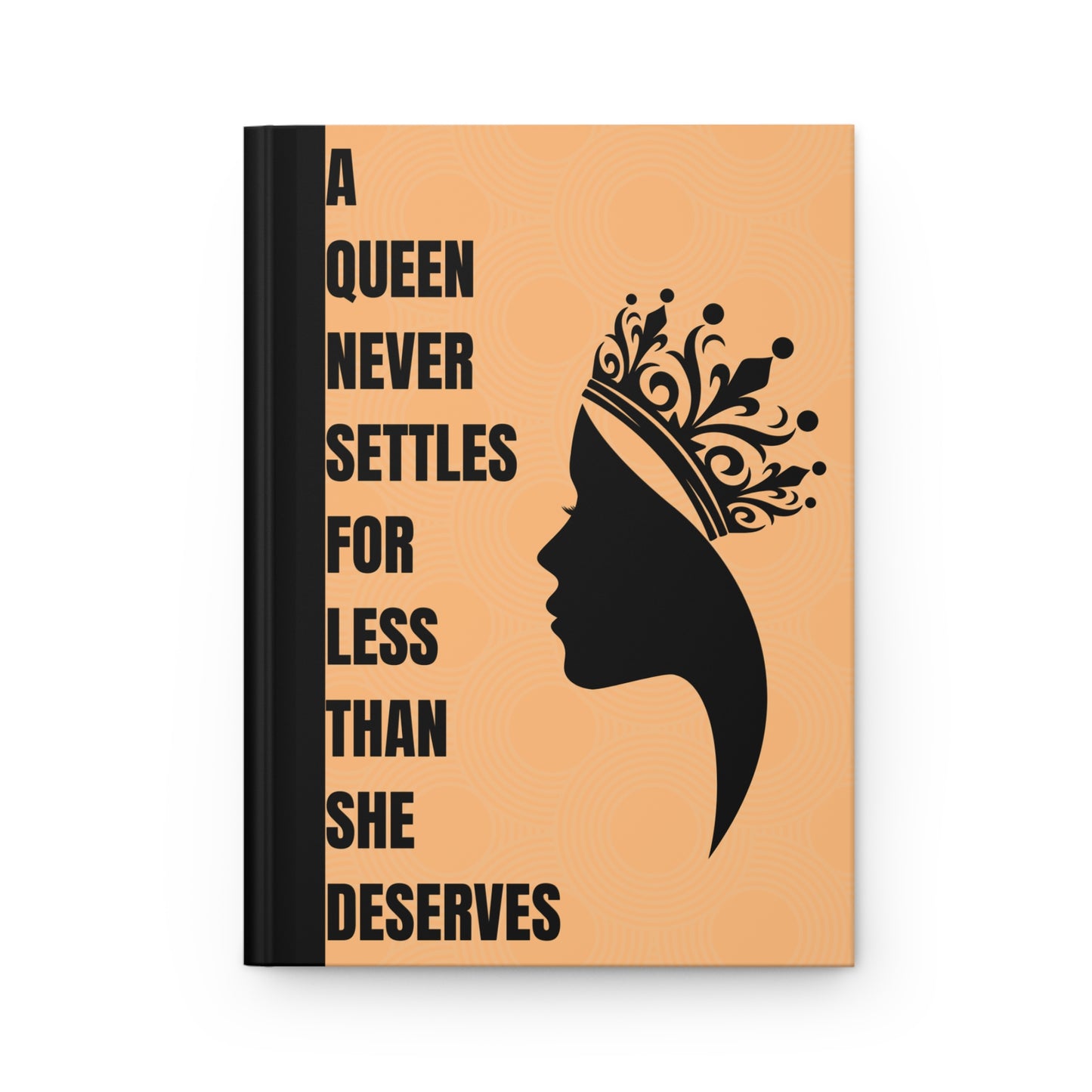 Notebook with a silhouette of a woman wearing a crown and text on a beige background