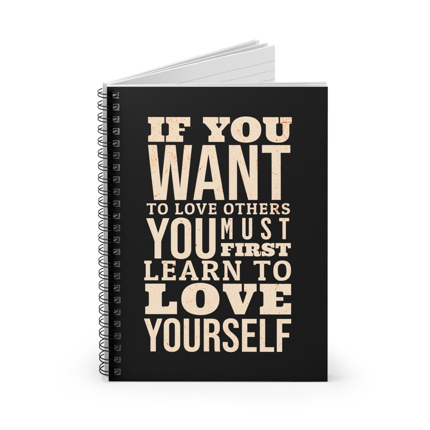 Notebook with motivational quote on a white background