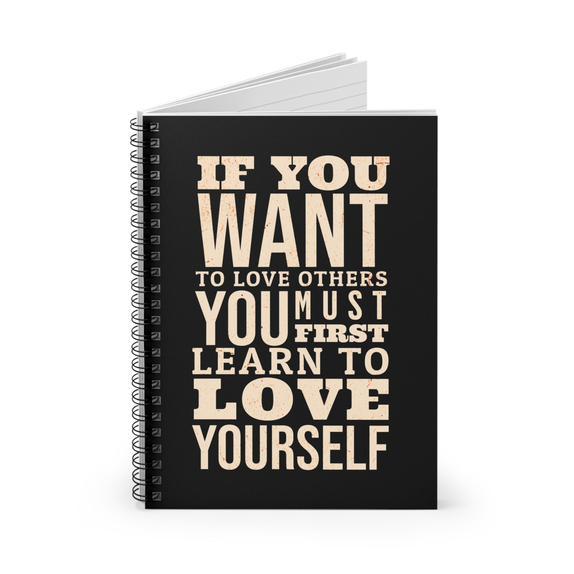 Notebook with motivational quote on a white background