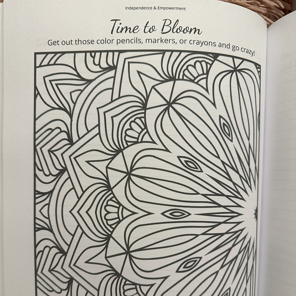 Coloring book page with intricate floral design and text encouraging creativity.