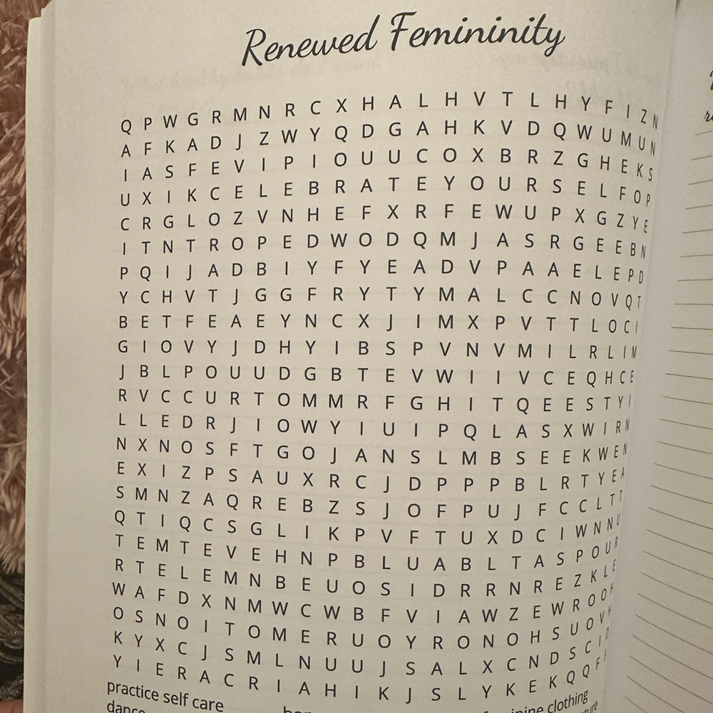 Word search puzzle titled 'Renewed Femininity' in a book.