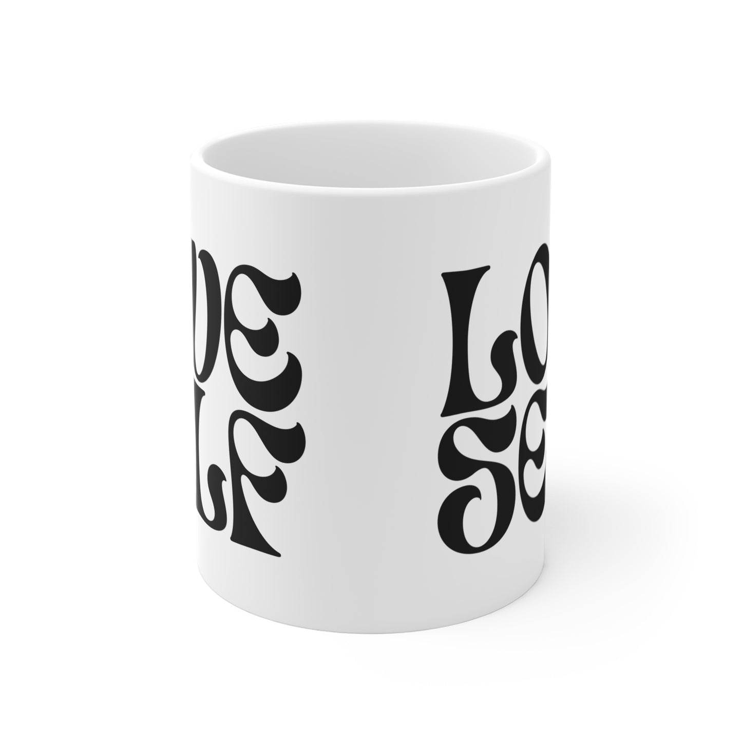 White mug with black text design on a white background