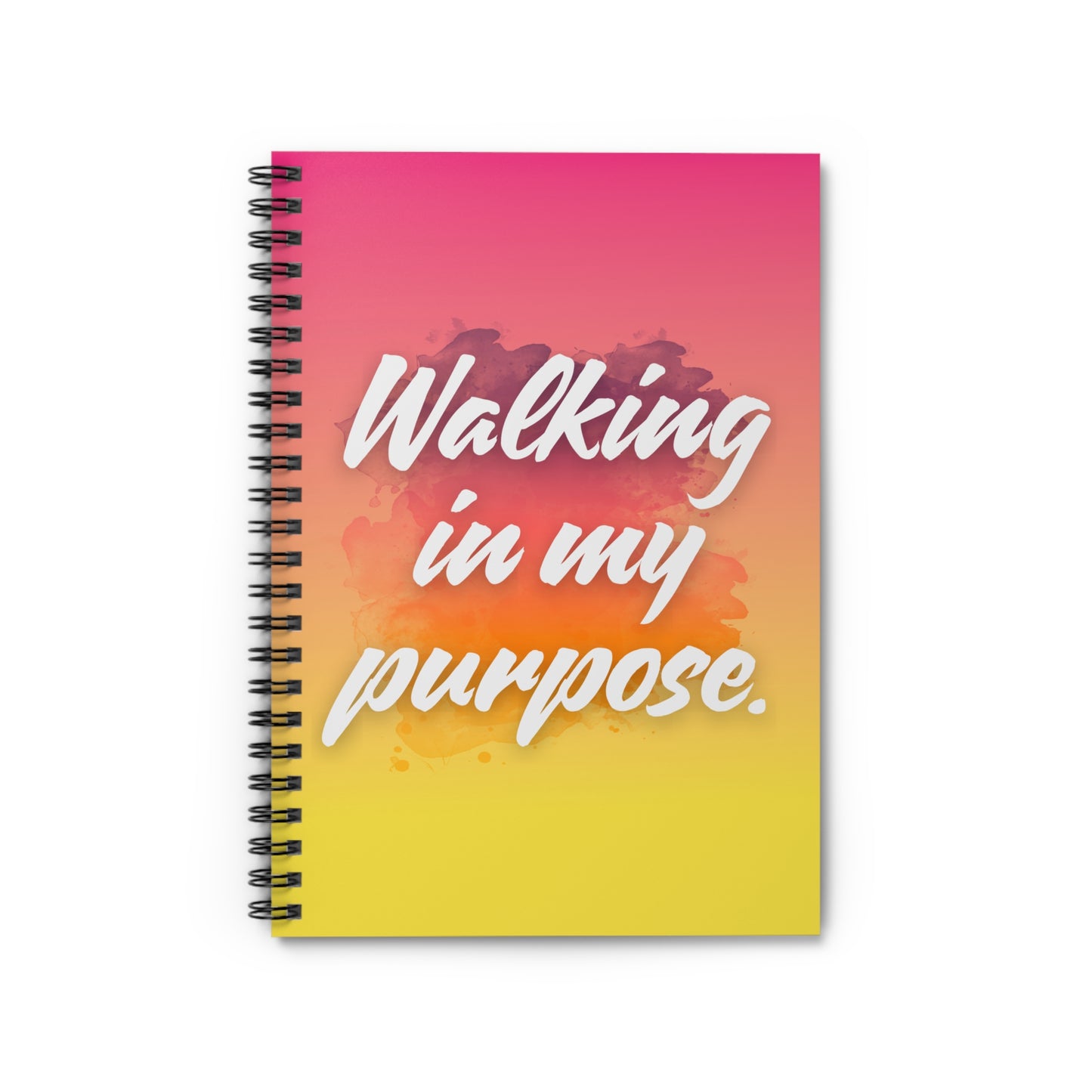 Notebook with 'Walking in my purpose' text on a pink to yellow gradient background