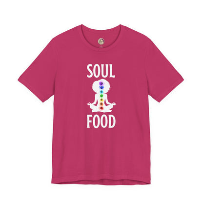 Pink t-shirt with 'Soul Food' design featuring a figure with chakra colors on a white background