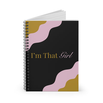Notebook with 'I'm That Girl' text on a black cover with pink and gold abstract designs.