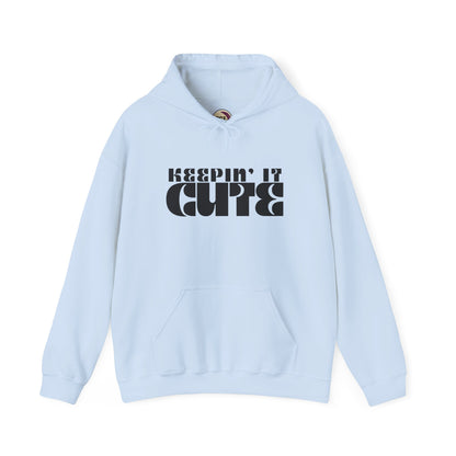 Light blue hoodie with 'KEEPIN' IT CUTE' text on a white background