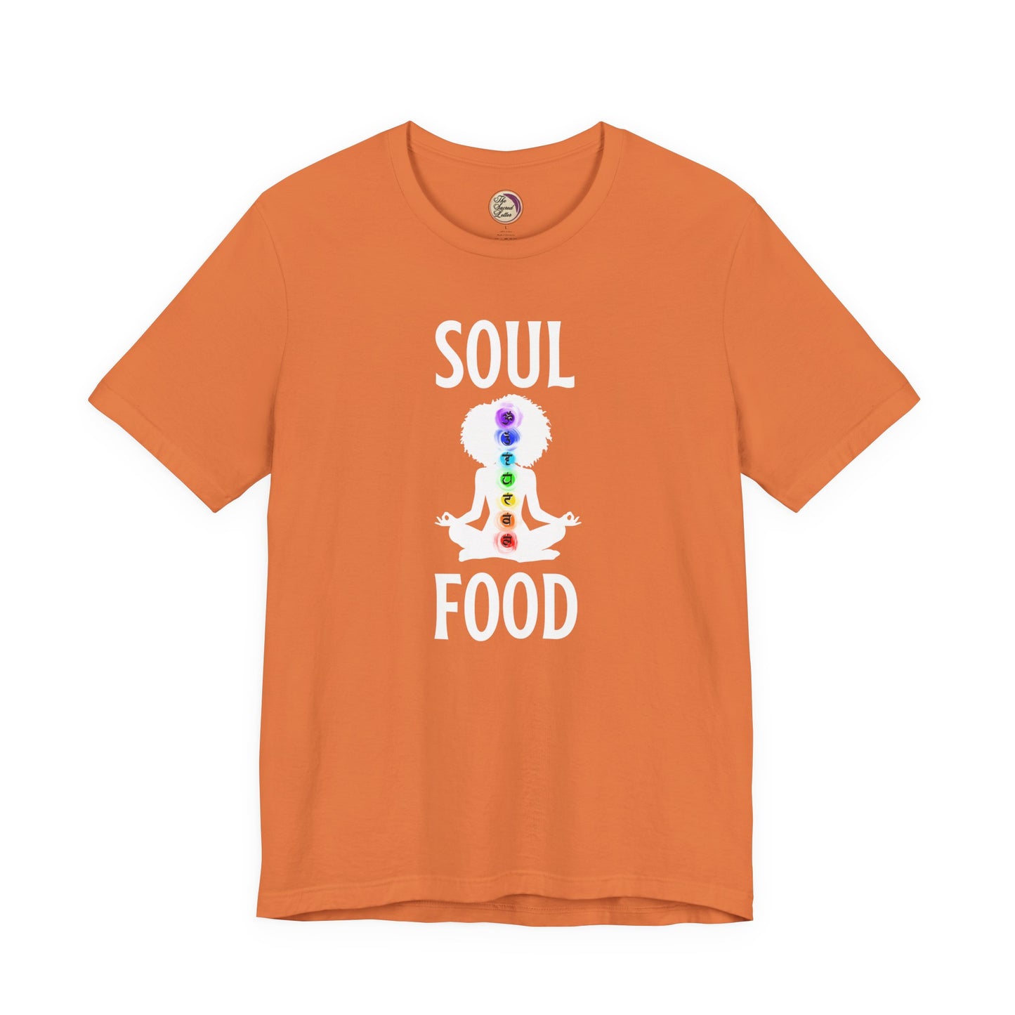 Orange t-shirt with 'Soul Food' design featuring a person in a meditative pose with chakra colors on a white background.