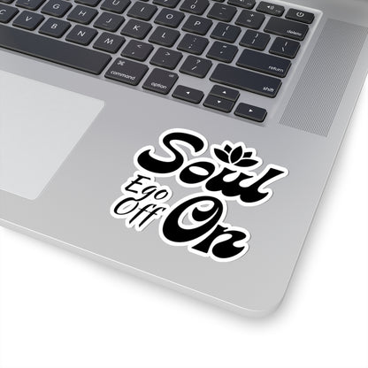 Laptop with a 'Soul Ego Off On' sticker on the palm rest area