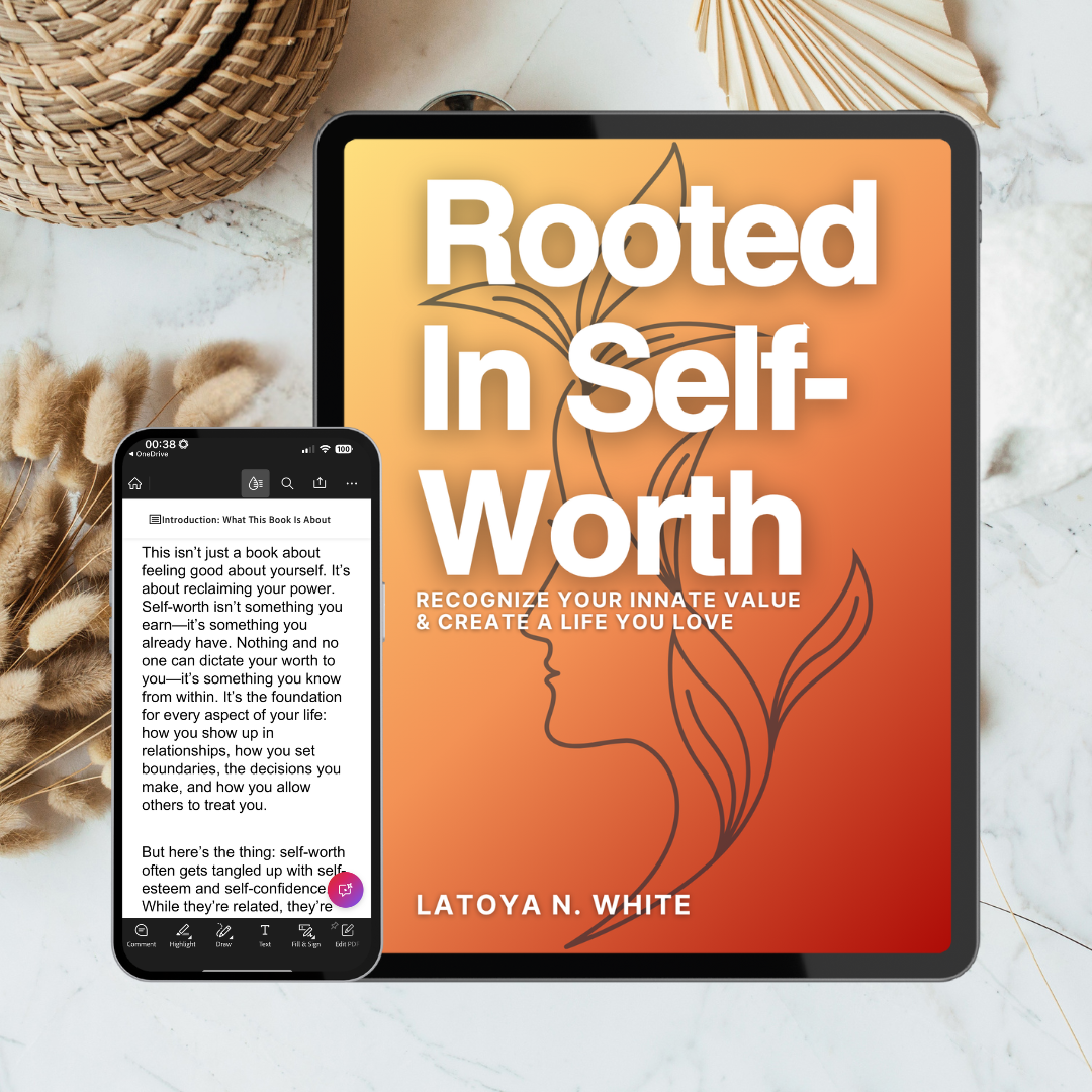 Tablet and smartphone displaying 'Rooted In Self-Worth' book cover on a marble surface.