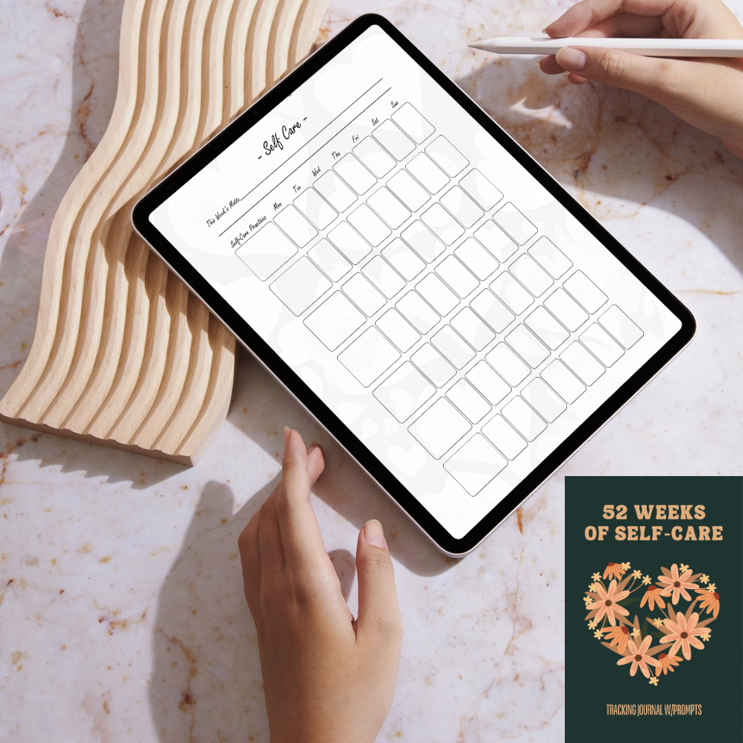 Person using a tablet with a self-care planner on a marble surface, next to a book titled '52 Weeks of Self-Care'.