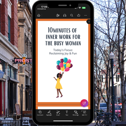Phone screen displaying an app with a woman holding balloons against a city street background